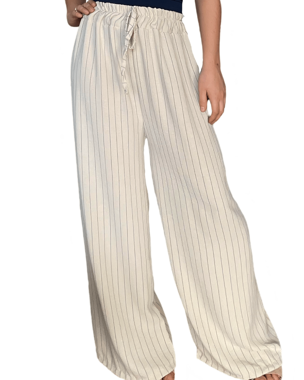 Pantalon palazzo beige rayé noir pour femme.