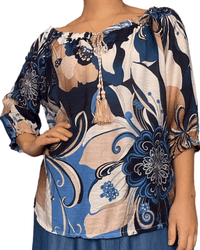 Blouse avec imprimé floral beige et marine pour femme.