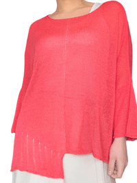 Chandail rouge en mailles décontracté pour femme.