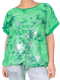 T-shirt vert avec imprimé floral argenté et vert pour femme.