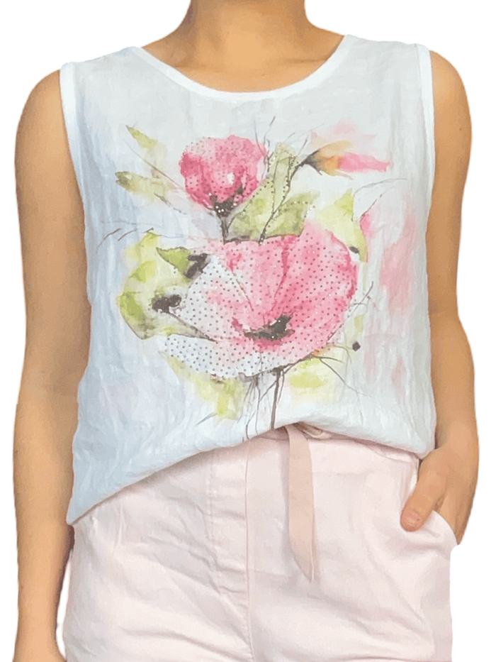Camisole blanche pour femme avec imprimé d'une fleur.