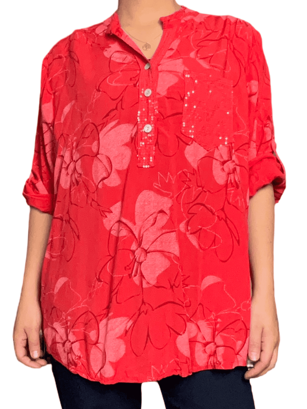 Blouse rouge avec imprimé floral pour femme.