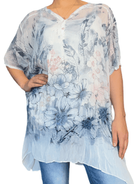 Blouse transparente avec imprimé floral pour femme.