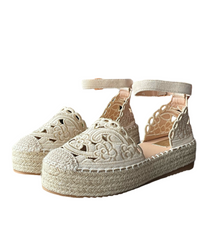 Sandale beige pour femme.