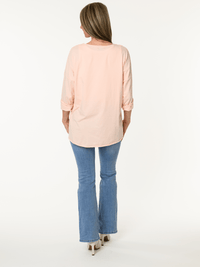 Chandail corail avec arbre de vie argenté