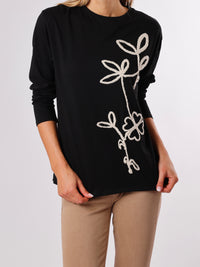 NEW - Chandail noir avec fleur texturée blanche