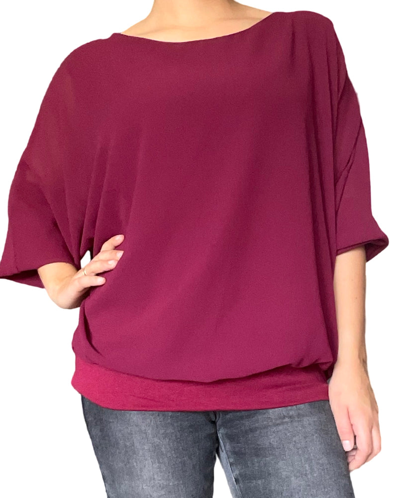 Blouse bourgogne à manches longues pour femme.