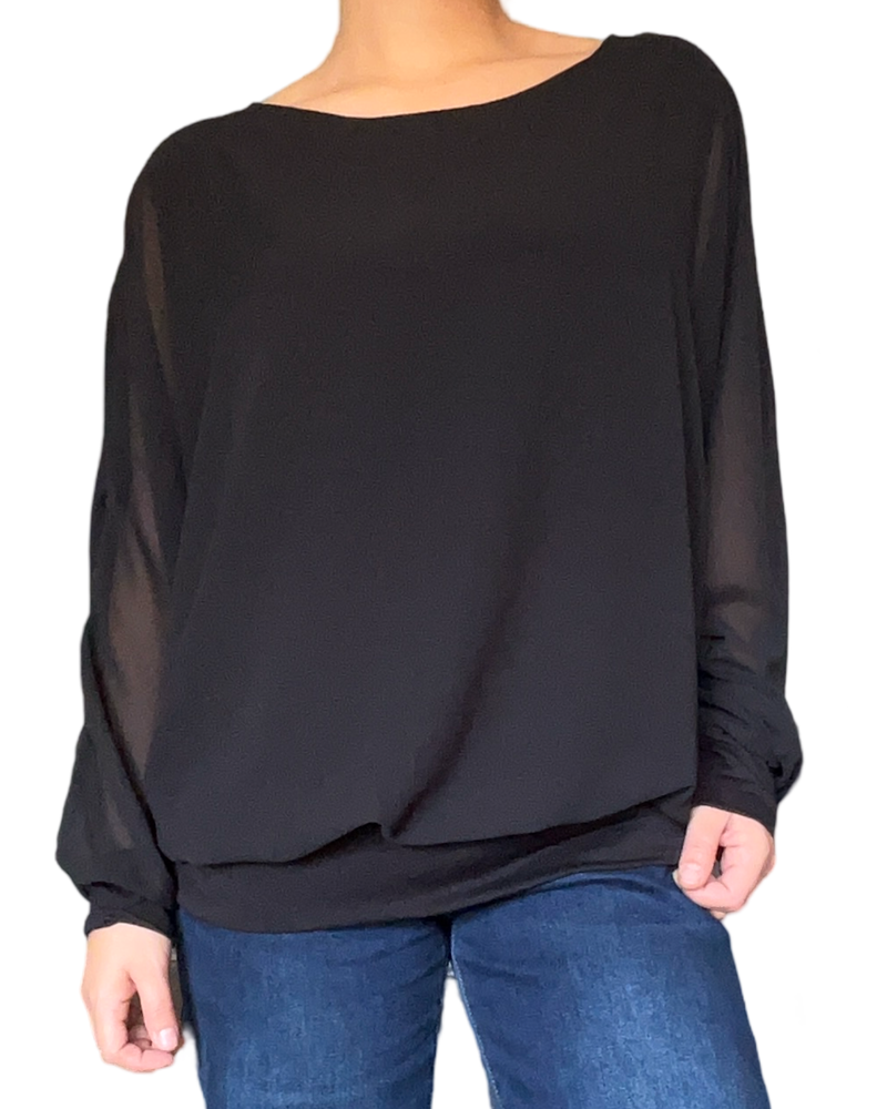 Blouse noire à manches longues pour femme.