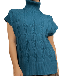 chandail bleu à col roulé style tricot pour femme.