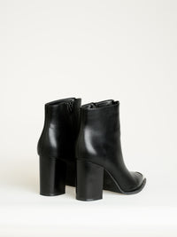 NEW - Botte noire en cuir végan avec bout métallique