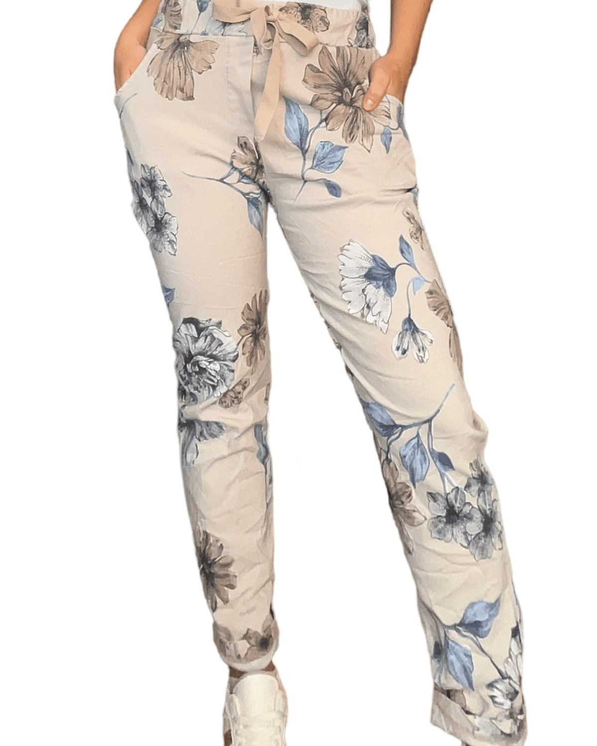 Pantalon beige à taille élastique pour femme avec imprimé floral.