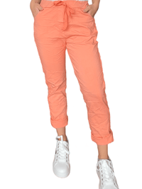 Pantalon orange à taille élastique avec cordon pour femme.