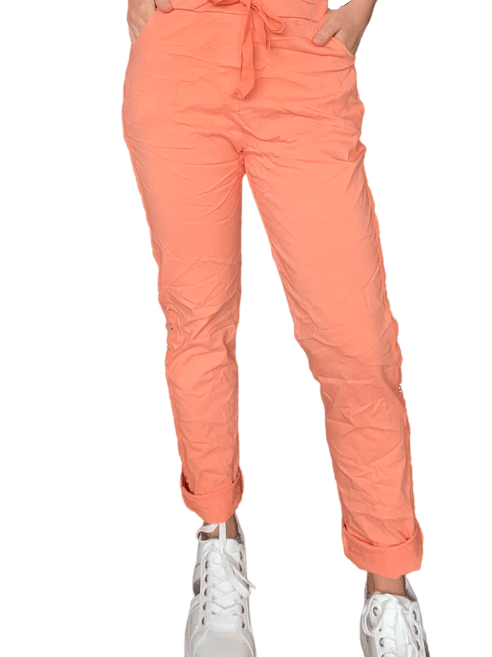 Pantalon orange à taille élastique avec cordon pour femme.