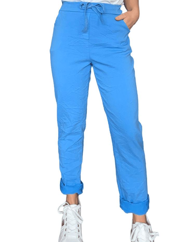 Pantalon bleu électrique à taille élastique avec cordon pour femme.