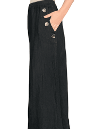 Pantalon palazzo noir avec boutons sur les côtés pour femme.