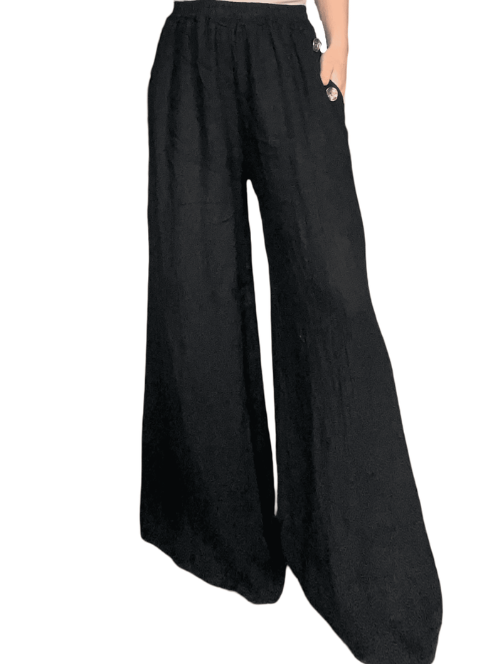 Pantalon palazzo noir avec boutons sur les côtés pour femme.