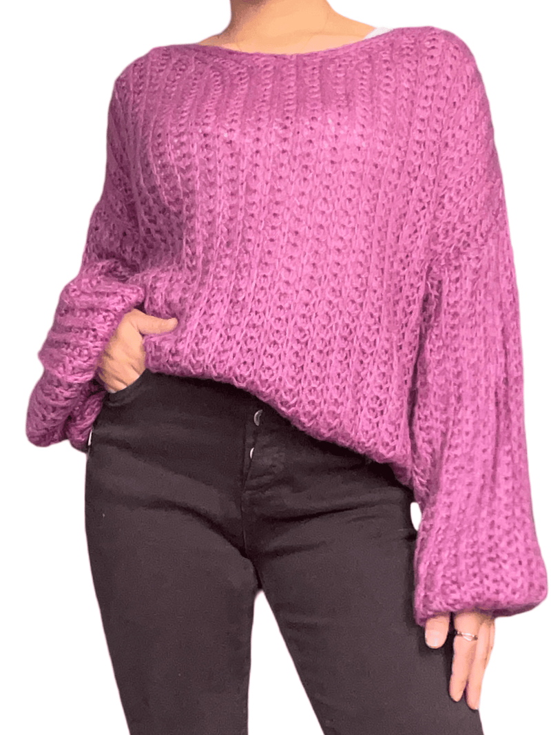 Chandail magenta en tricot pour femme.