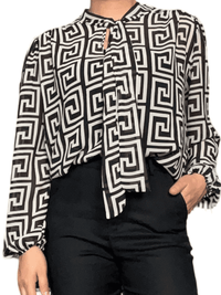 Blouse avec imprimé géométrique beige et noir pour femme.