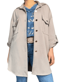 Chandail bleu jean avec franges pour femme avec veste.