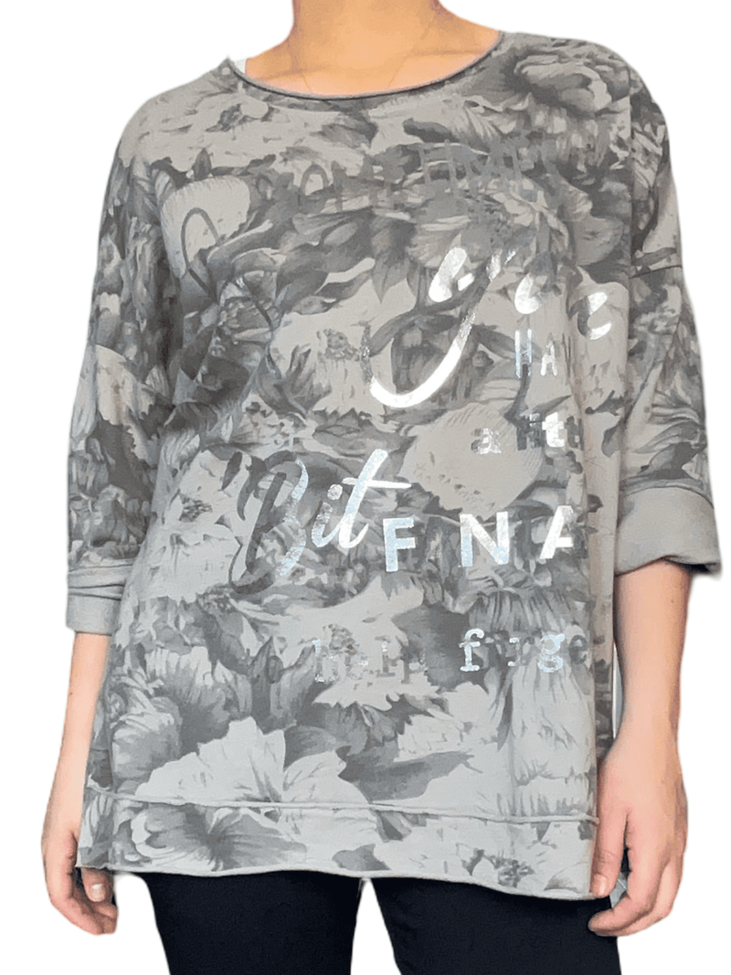 Chandail moka avec imprimé floral pour femme.