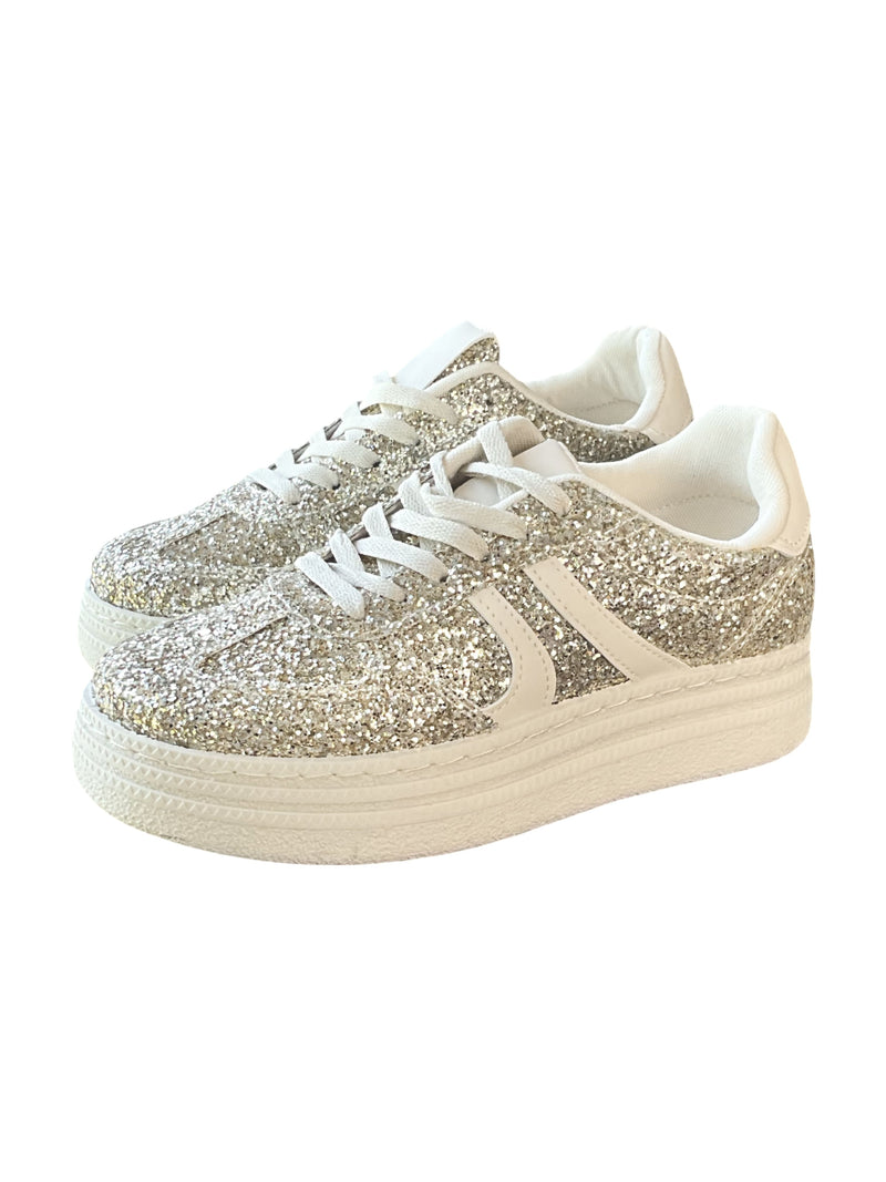 Sneaker beige à paillettes pour femme.