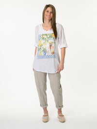 Chandail blanc avec imprimé de citrons et de feuilles