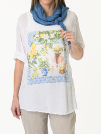 Chandail blanc avec imprimé de citrons et de feuilles