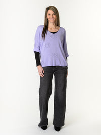 Chandail lilas à motifs floraux