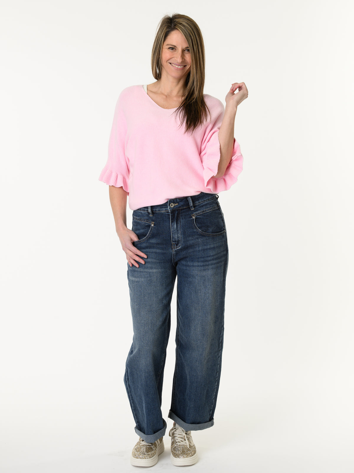 Chandail rose pâle à manche à volant