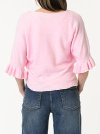 Chandail rose pâle à manche à volant