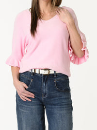 Chandail rose pâle à manche à volant