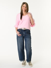 Chandail rose pâle à manche à volant