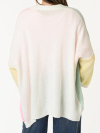 Veste multicolore avec boutons dorés