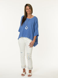 Chandail bleu jean avec bas effiloché