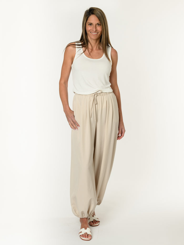Pantalon génie beige avec plis français en avant