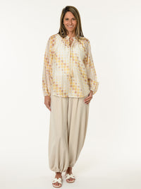 Blouse romantique à motifs de pois jaunes