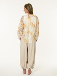 Blouse romantique à motifs de pois jaunes