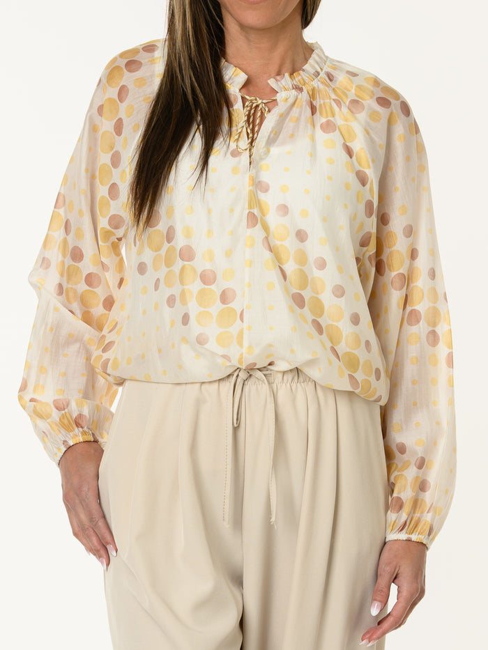 Blouse romantique à motifs de pois jaunes