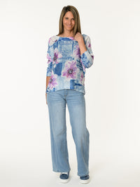 Chandail bleu jeans avec imprimé de fleurs lilas