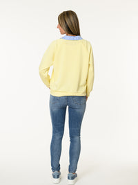 Chandail jaune avec col chemise