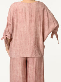 Chandail vieux rose avec lacets sur les côtés