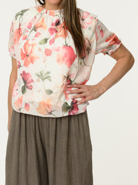 Blouse blanche en voile avec imprimé floral