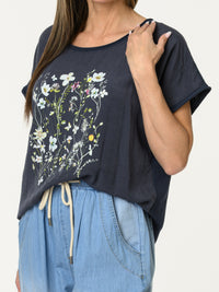 t-shirt marine avec imprimé floral blanc