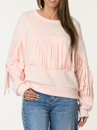 Chandail rose pâle avec franges