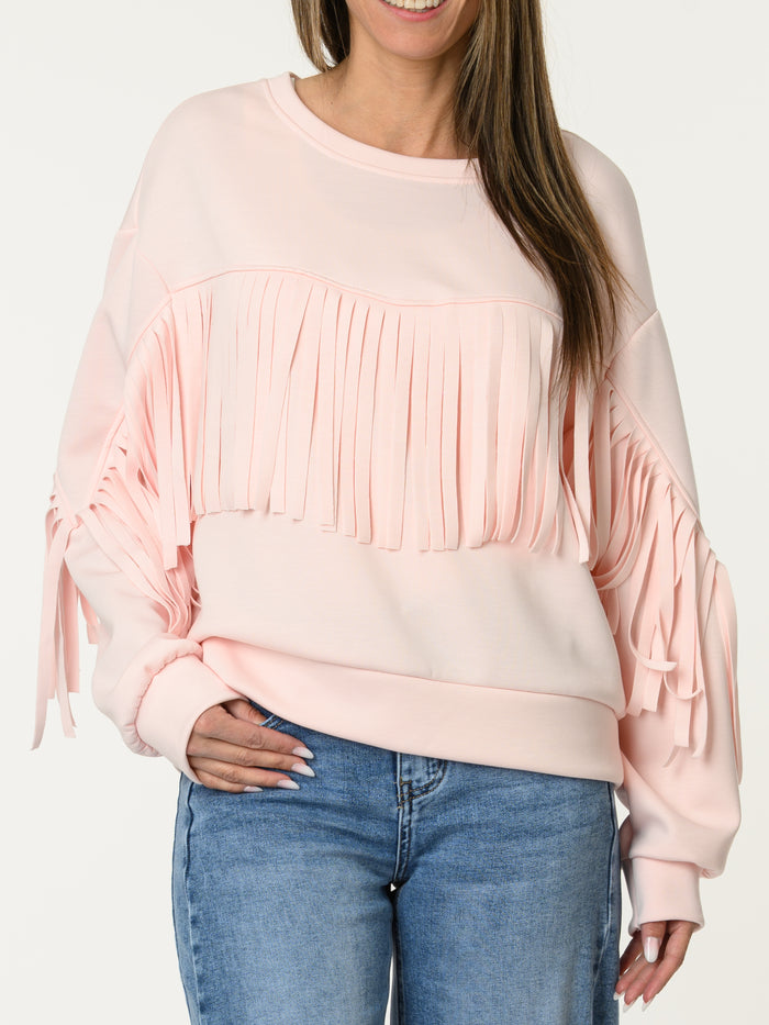 Chandail rose pâle avec franges