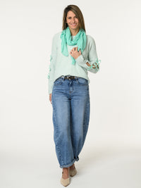 Chandail aqua avec lacets sur les côtés