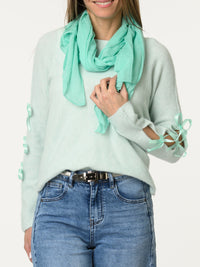 Chandail aqua avec lacets sur les côtés