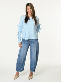 Chandail bleu ciel avec lacets sur les côtés