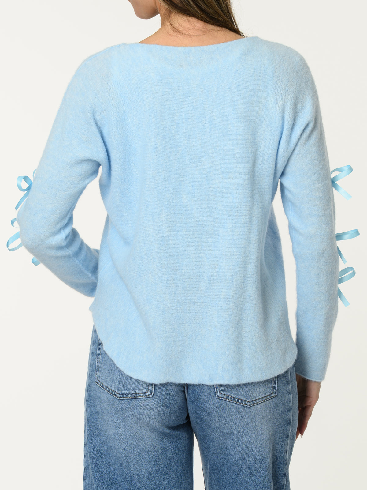 Chandail bleu ciel avec lacets sur les côtés