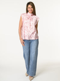 Camisole rose à col montant avec imprimé de fleurs